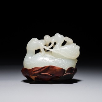 A Chinese jade group of two Mandarin ducks on lotus leaf, 19th C.